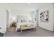 Bright bedroom showcasing a comfortable bed with a padded headboard and stylish decorative pillows at 1507 Fountain View St, Ormond Beach, FL 32174