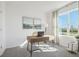 Bright office with a large window providing natural light, a sleek wooden desk and neutral colored walls at 1507 Fountain View St, Ormond Beach, FL 32174