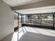 Screened in patio with views of the backyard at 15525 Seymour Ln, Groveland, FL 34736