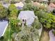 Beautiful aerial view of the home showcasing the roof, landscaping, and neighborhood at 1613 Glenwick Dr, Windermere, FL 34786