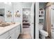 En suite bathroom featuring double sinks and a view into the bedroom at 1613 Glenwick Dr, Windermere, FL 34786