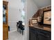 Dining room with built-in cabinets, decorative accents, and an adjacent eating area at 1613 Glenwick Dr, Windermere, FL 34786