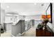 Hallway with wrought iron railing and a decorative furnishing set at 1613 Glenwick Dr, Windermere, FL 34786