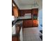 Functional kitchen features ample cabinet space, granite countertops, and modern appliances at 1616 Ferndell Rd, Orlando, FL 32808