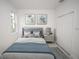 Inviting bedroom with soft blue accents, a cozy bed, and ample closet space at 16815 Sw 41St Avenue Rd, Ocala, FL 34473