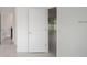 Hallway leading to the bathroom and living area of the home at 16815 Sw 41St Avenue Rd, Ocala, FL 34473