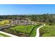 Scenic view of a fenced dog park within a community, offering a safe space for pets to play and socialize at 17667 Saw Palmetto, Clermont, FL 34714