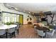 Spacious community lounge with modern furniture, decor and large dining area at 17667 Saw Palmetto, Clermont, FL 34714