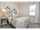 Bright main bedroom with decorative wall art and comfortable decor at 17667 Saw Palmetto, Clermont, FL 34714