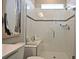 Walk-in shower features tiled walls, built-in seating, and sleek glass enclosure at 17667 Saw Palmetto, Clermont, FL 34714