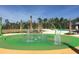 Community splash pad with palm trees and water features for playful recreation at 17667 Saw Palmetto, Clermont, FL 34714