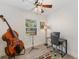 Bright bedroom featuring a desk and ceiling fan at 1832 Magnolia Ave, Winter Park, FL 32789