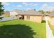 Spacious, fenced backyard with lush green grass at 1862 Great Falls Way, Orlando, FL 32824