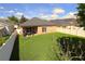 Large, well-maintained backyard with privacy fence and plenty of room for outdoor activities at 1862 Great Falls Way, Orlando, FL 32824