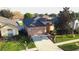 A single-Gathering home situated in a well-maintained neighborhood with a manicured lawn at 1862 Great Falls Way, Orlando, FL 32824