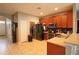 Efficient kitchen with ample cabinet space and stainless steel appliances at 1862 Great Falls Way, Orlando, FL 32824