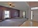 Spacious living room featuring a large window for natural light at 1862 Great Falls Way, Orlando, FL 32824