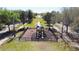 Aerial view of a community playground surrounded by mature trees and walking paths, ideal for outdoor activities at 1862 Great Falls Way, Orlando, FL 32824