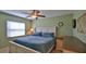 Cozy bedroom with ample natural light and a comfortable bed at 209 Georgetowne Blvd, Daytona Beach, FL 32119