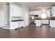 Spacious open-concept kitchen with white cabinetry, stainless steel appliances, and a large center island at 2934 Wild Tamarind Blvd, Orlando, FL 32828