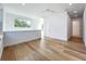 Bonus room with light floors, multiple windows, and white trim at 3206 Harrison Ave, Orlando, FL 32804