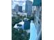 Scenic aerial view showcasing a building and a lake with cityscape background at 322 E Central Blvd # 1805, Orlando, FL 32801
