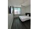 Bedroom with large windows offering cityscape views and modern flooring at 322 E Central Blvd # 1805, Orlando, FL 32801