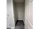 Open, empty closet with dark gray wood floors in a condo or apartment at 322 E Central Blvd # 1805, Orlando, FL 32801