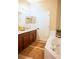 Bathroom with double vanity and jacuzzi-style tub offering a relaxing retreat at 346 Canyon Stone Cir, Lake Mary, FL 32746