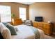 Bright bedroom featuring light wood furnishings and calming neutral-toned decor at 346 Canyon Stone Cir, Lake Mary, FL 32746
