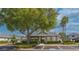 Community clubhouse featuring covered entry, landscaped grounds, and convenient parking at 346 Canyon Stone Cir, Lake Mary, FL 32746