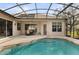 Enclosed pool with hot tub and outdoor seating at 3603 Westover Cir, Leesburg, FL 34748