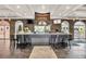 Stylish bar area with ample seating, modern decor, and a wide selection of beverages at 438 Miramar Ave, Davenport, FL 33897