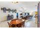Bright living room with comfortable seating and an open layout to the kitchen at 442 Jessamine Dr, Davenport, FL 33837