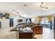 Open-concept living room features granite counters, tile floors, and ample natural light at 442 Jessamine Dr, Davenport, FL 33837