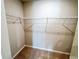 The walk-in closet is carpeted and equipped with shelving for optimal storage at 464 Patricia Alford Dr, Haines City, FL 33844