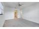 Bedroom has a ceiling fan, neutral carpet and a walk-in closet at 5202 Greenway Drive, Orlando, FL 32819