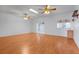 The living room has recessed lights, hardwood floors, and a wet bar at 5202 Greenway Drive, Orlando, FL 32819