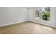 Cozy bedroom featuring luxury vinyl flooring, and natural light at 5215 Ashwood Pl, Orlando, FL 32808