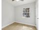 Bedroom featuring a window with lots of light and vinyl flooring at 5215 Ashwood Pl, Orlando, FL 32808