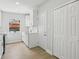 Clean, white kitchen with modern cabinetry, countertops, and updated appliances at 5215 Ashwood Pl, Orlando, FL 32808