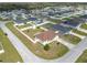 Expansive aerial view of a community featuring well-maintained homes and fenced yards, close to nearby amenities at 5361 Se 92Nd St, Ocala, FL 34480