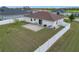 Fenced-in backyard features a patio and outdoor storage shed at 5361 Se 92Nd St, Ocala, FL 34480
