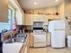 Well-maintained kitchen offering essential appliances and plenty of cabinet storage at 5361 Se 92Nd St, Ocala, FL 34480