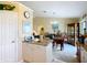Open concept showing kitchen with a view of the dining area, great for socializing while cooking at 5361 Se 92Nd St, Ocala, FL 34480