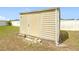 Outside shot of the storage shed with ample room for lawn equipment and tools at 5361 Se 92Nd St, Ocala, FL 34480