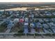 Stunning aerial view capturing beachfront homes with direct access to the sandy shorelines, and coastal lifestyle at 6480 S Atlantic Ave, New Smyrna Beach, FL 32169