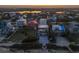 Picturesque aerial shot featuring homes near the tranquil beach and serene river, perfect for coastal living at 6480 S Atlantic Ave, New Smyrna Beach, FL 32169