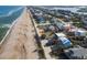 Coastal home offering easy beach access, ocean views and proximity to local amenities at 6480 S Atlantic Ave, New Smyrna Beach, FL 32169