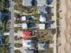 Overhead view of beach community houses, some with pools, near beach access and a coastal highway at 6480 S Atlantic Ave, New Smyrna Beach, FL 32169